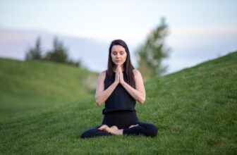 A serene setting with a person practicing breathwork, surrounded by nature or in a peaceful indoor environment.